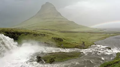 Kirkjufellsfoss: A tiered waterfall framing the Snaefellsnes Peninsula's iconic mountain peak