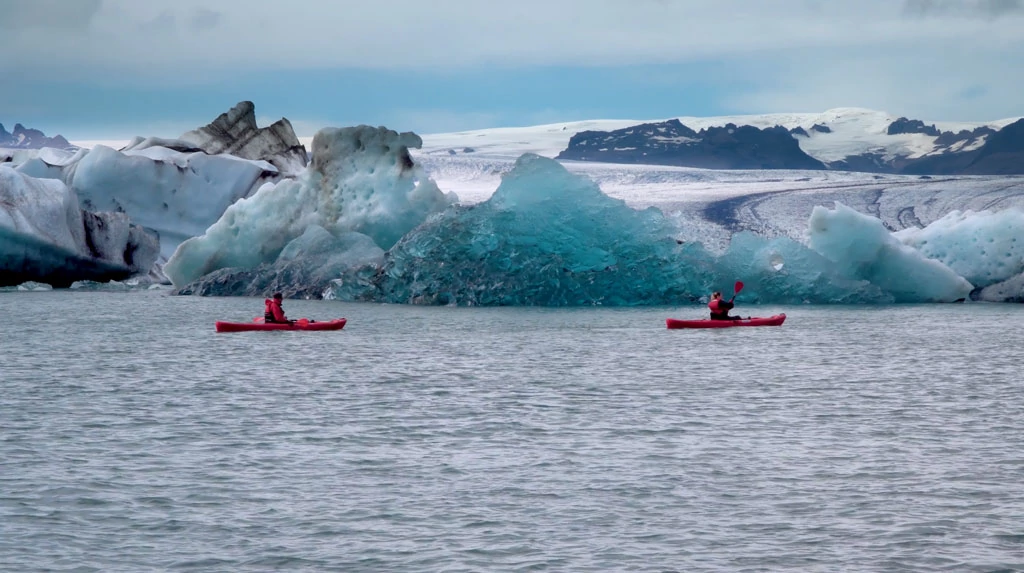 Kayaking under jokulsarlon clacier in iceland 